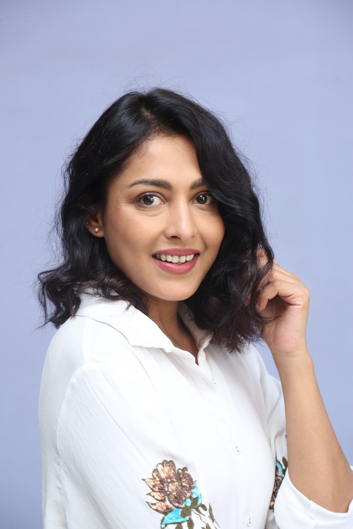 Madhu Shalini in chic hairstyle and white outfit