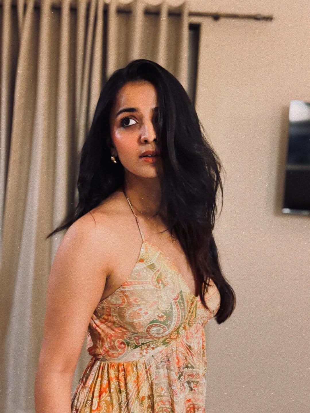 Mahima Makwana exudes effortless elegance in a vibrant, patterned dress that proves style is all about confidence and a splash of fun–who says you can't have both?