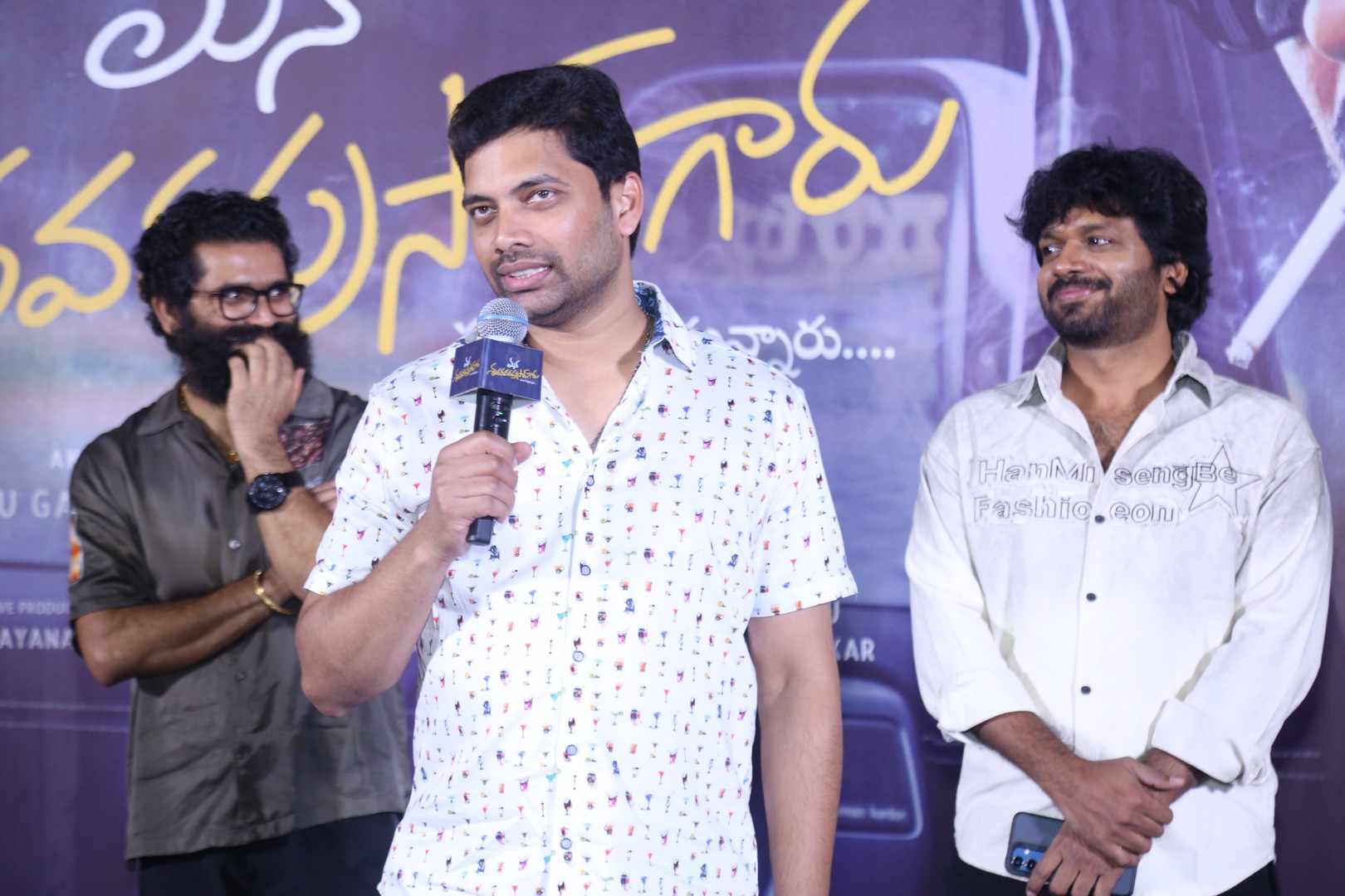 Sahu Garapati delivering speech on stage