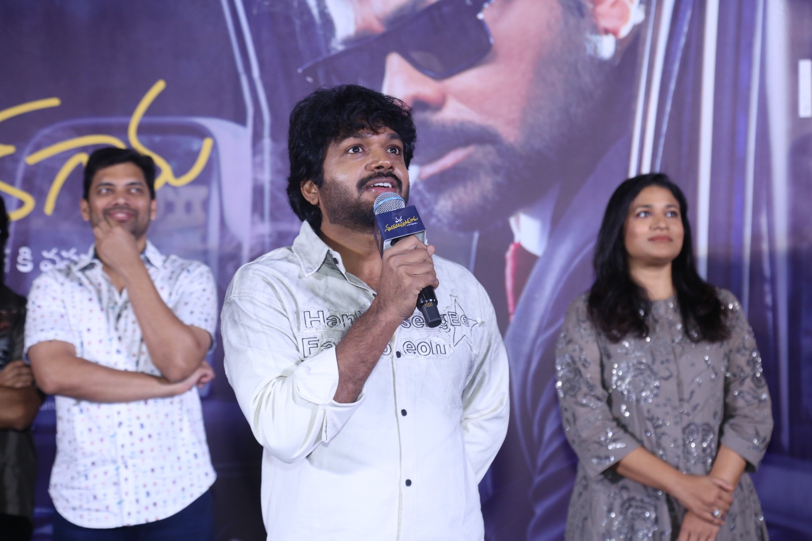 Anil Ravipudi giving speech on stage