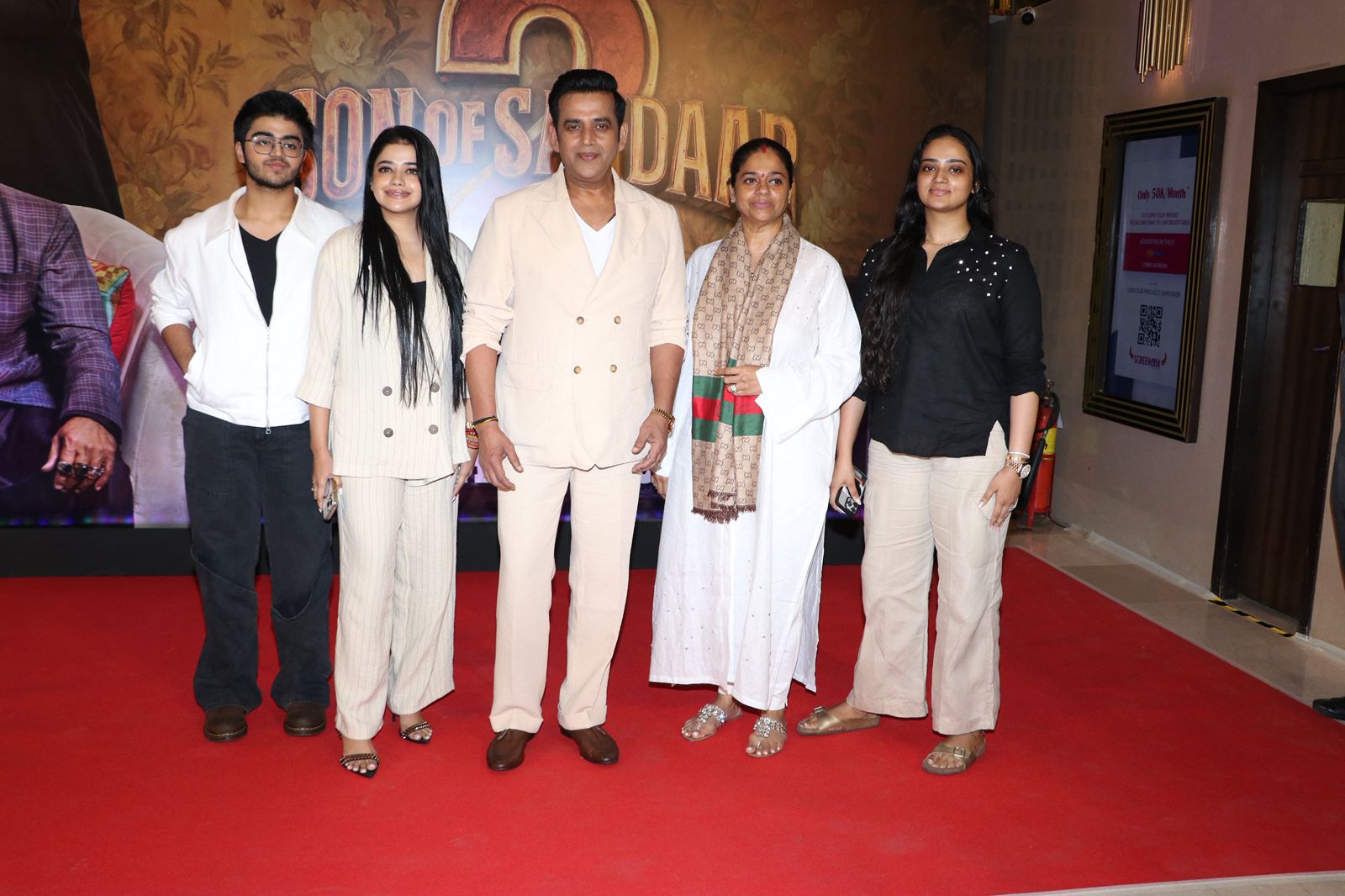 A candid family moment with Riva Kishan, Ravi Kishan, and Preeti Kishan captured during the event.
