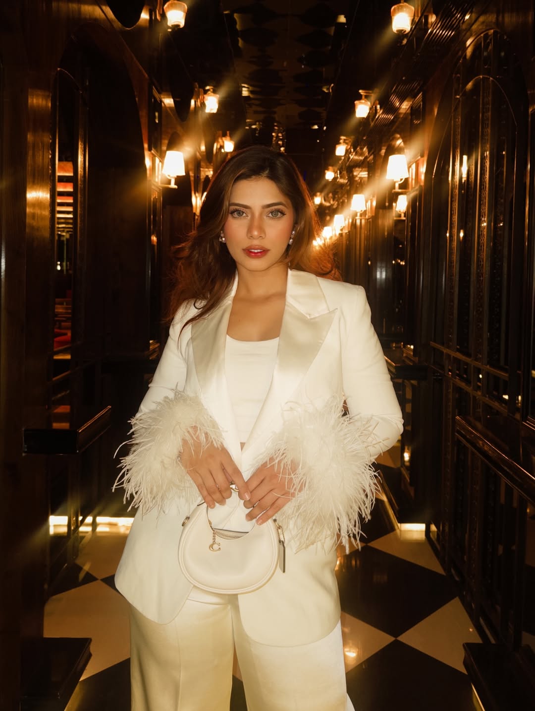 Nagma Mirajkar in chic white feathered outfit