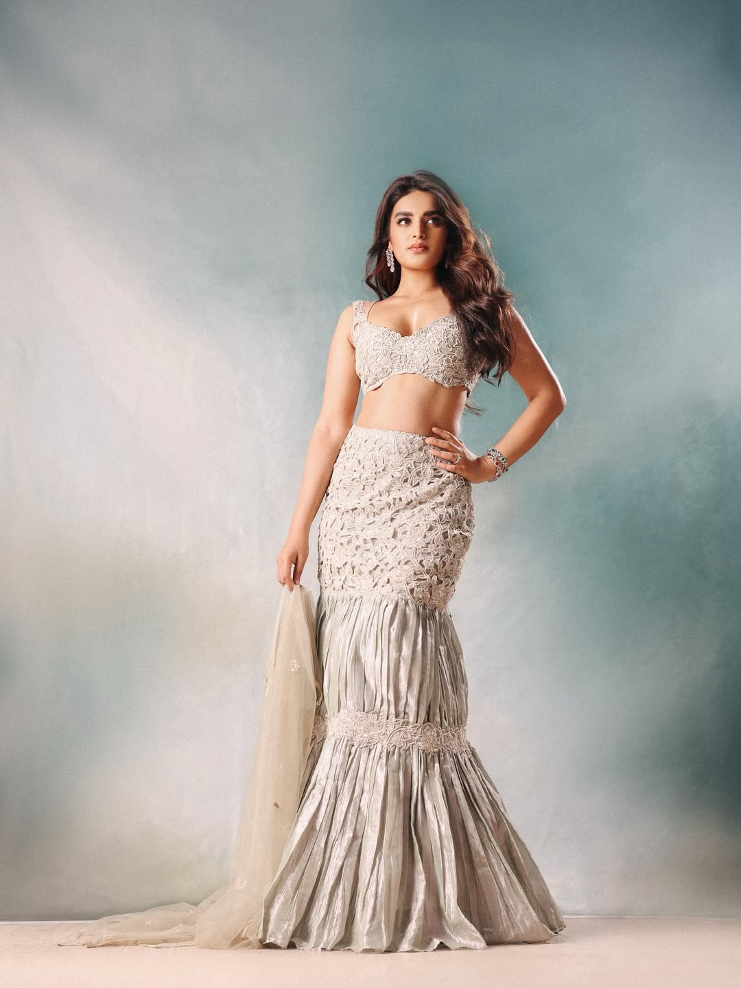 Nidhhi Agerwal radiates timeless elegance in a stunning, intricately designed gown that seamlessly blends tradition with a modern twist–proof that style is all about making a statement, even without saying a word!