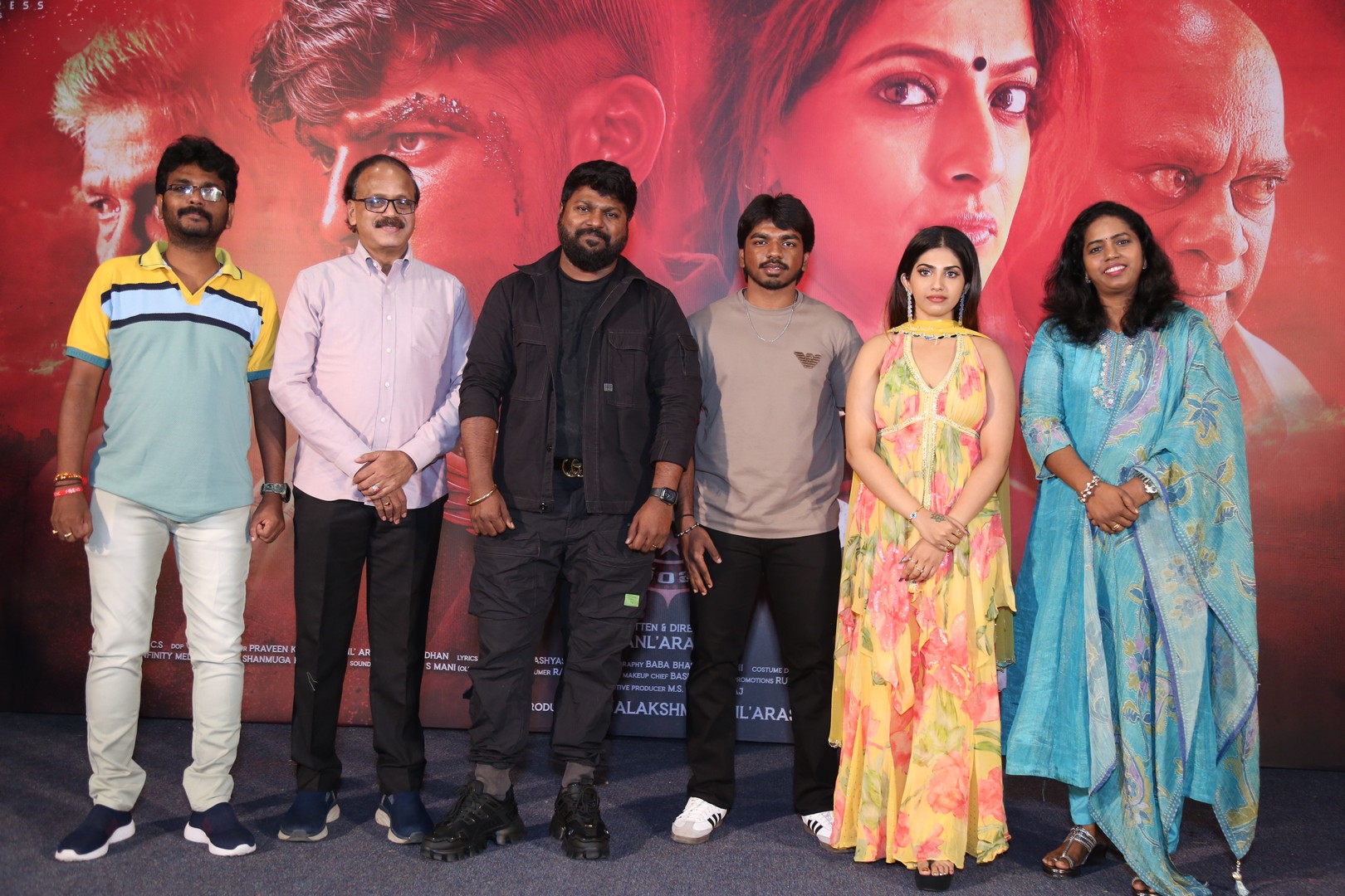 Writer Basha Sri, Producer Dhananjayan, Director Anal Arasu, Actor Surya Sethupathi, Actress Varsha, and Producer Rajalakshmy come together for a group media photoshoot.