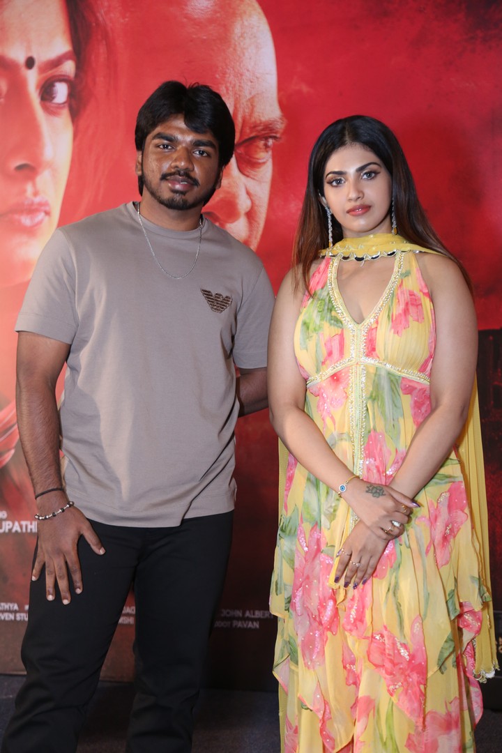 Actor Surya Sethupathi and Actress Varsha pose together for the media photoshoot.