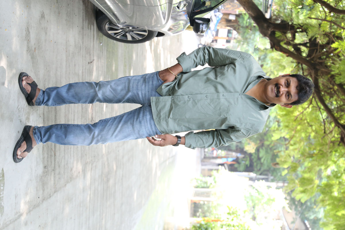 Praveen’s effortlessly cool look proves that comfort and style can walk hand in hand–even in flip-flops, he's ready to take on the world with a smile!
