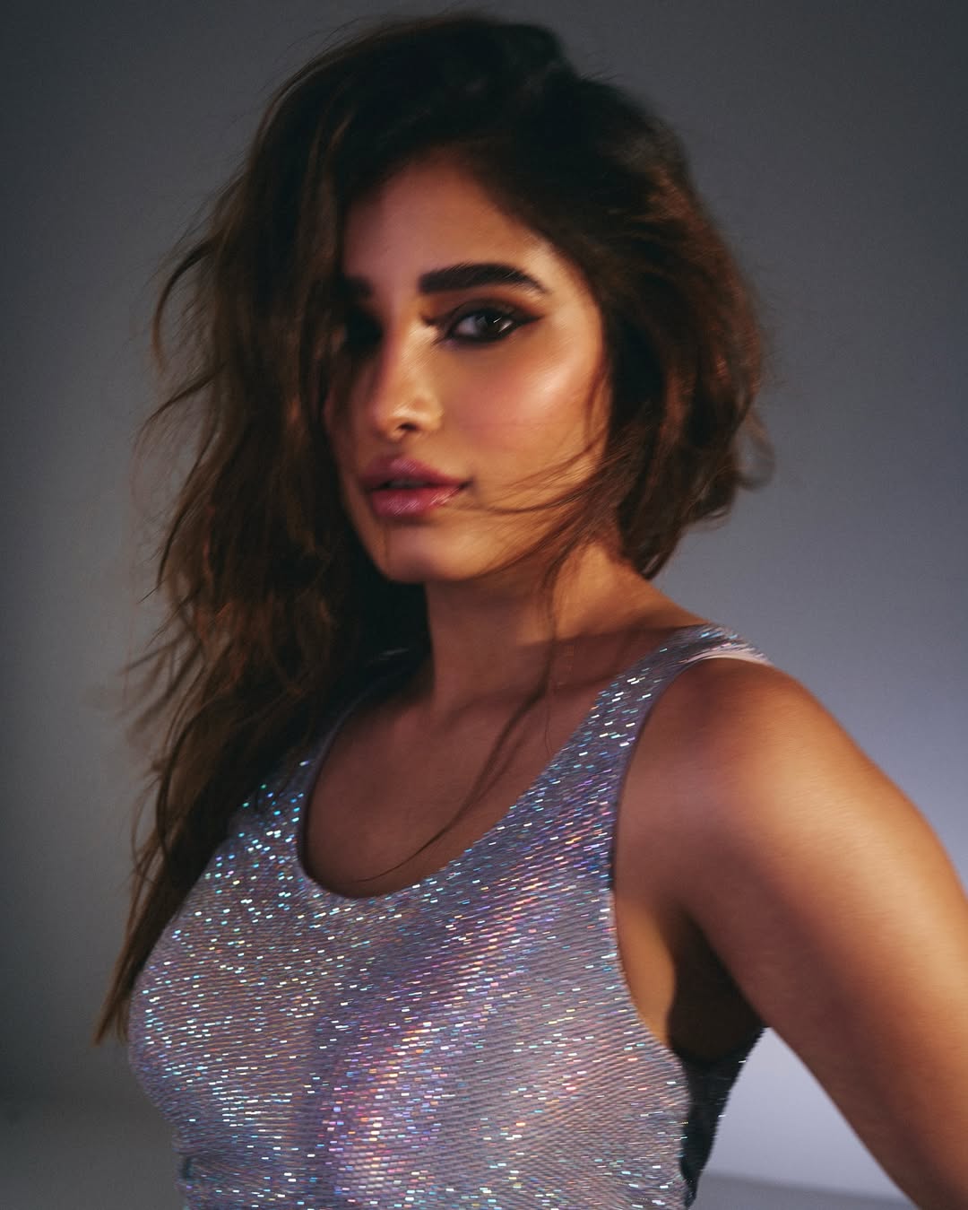 Rasha Thadani in sparkling outfit radiating sophistication