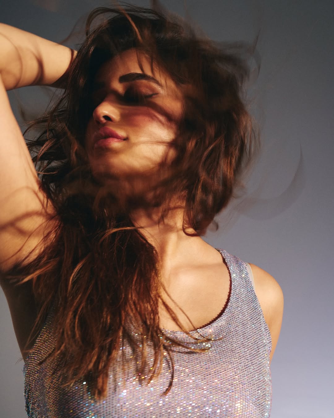 Rasha Thadani in glamorous shimmering ensemble exuding confidence