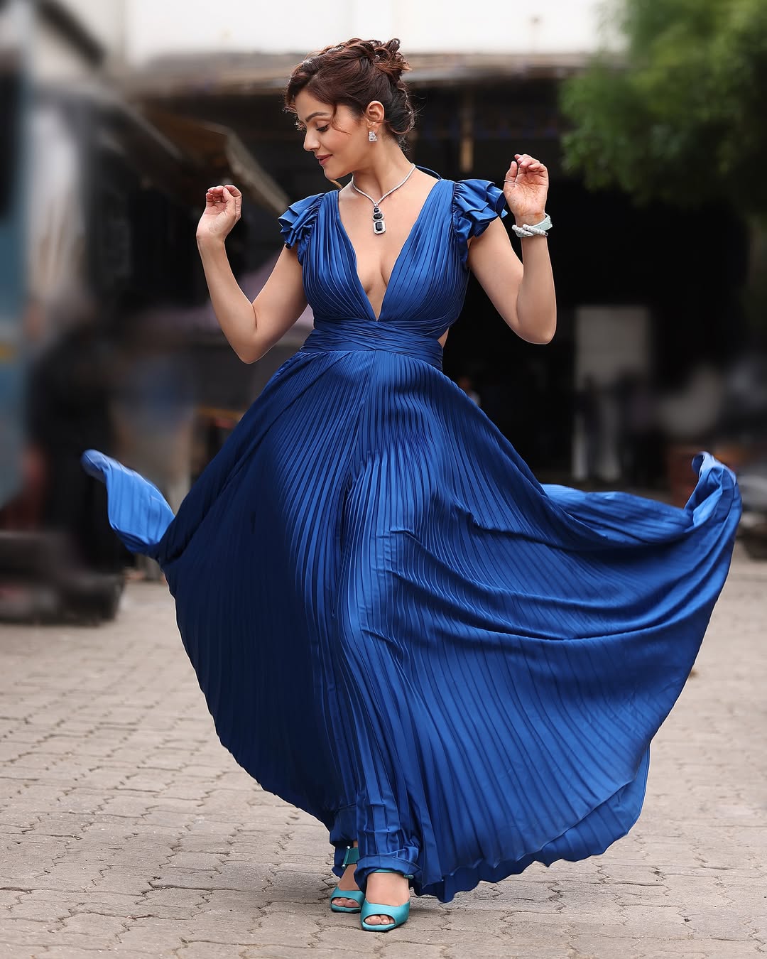 Rubina Dilaik effortlessly combines regal elegance with playful flair in this stunning royal blue gown—proof that she’s mastered the art of turning heads while having a little fun!