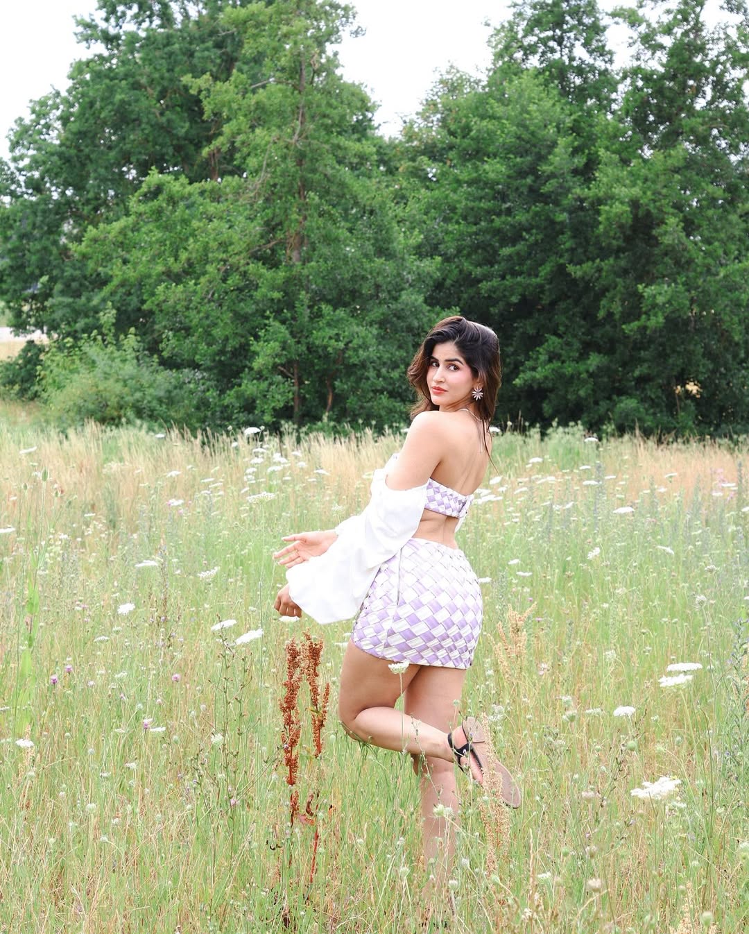 Sakshi Malik effortlessly blends sporty chic with a touch of floral flair–proof that style and comfort can bloom together in the wild!