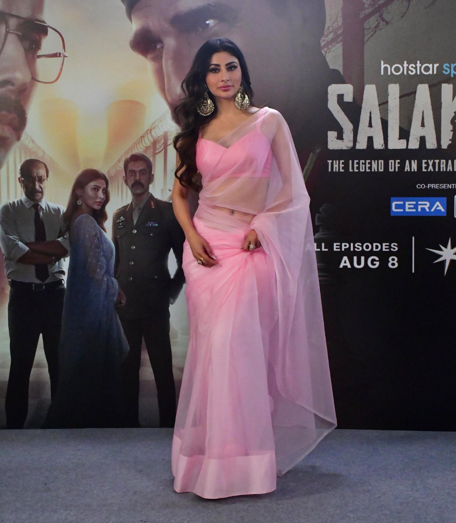 Mouni Roy captivates with her solo pose at the media photoshoot, exuding elegance and charm.