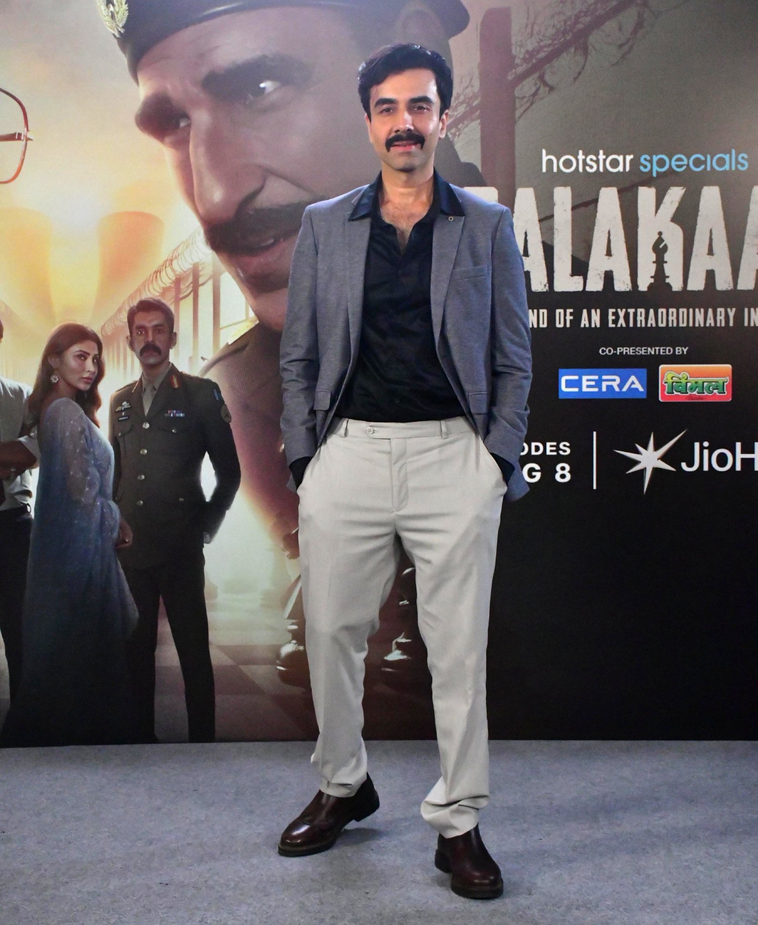 Naveen Kasturia poses confidently for solo clicks, bringing a touch of casual sophistication to the event.