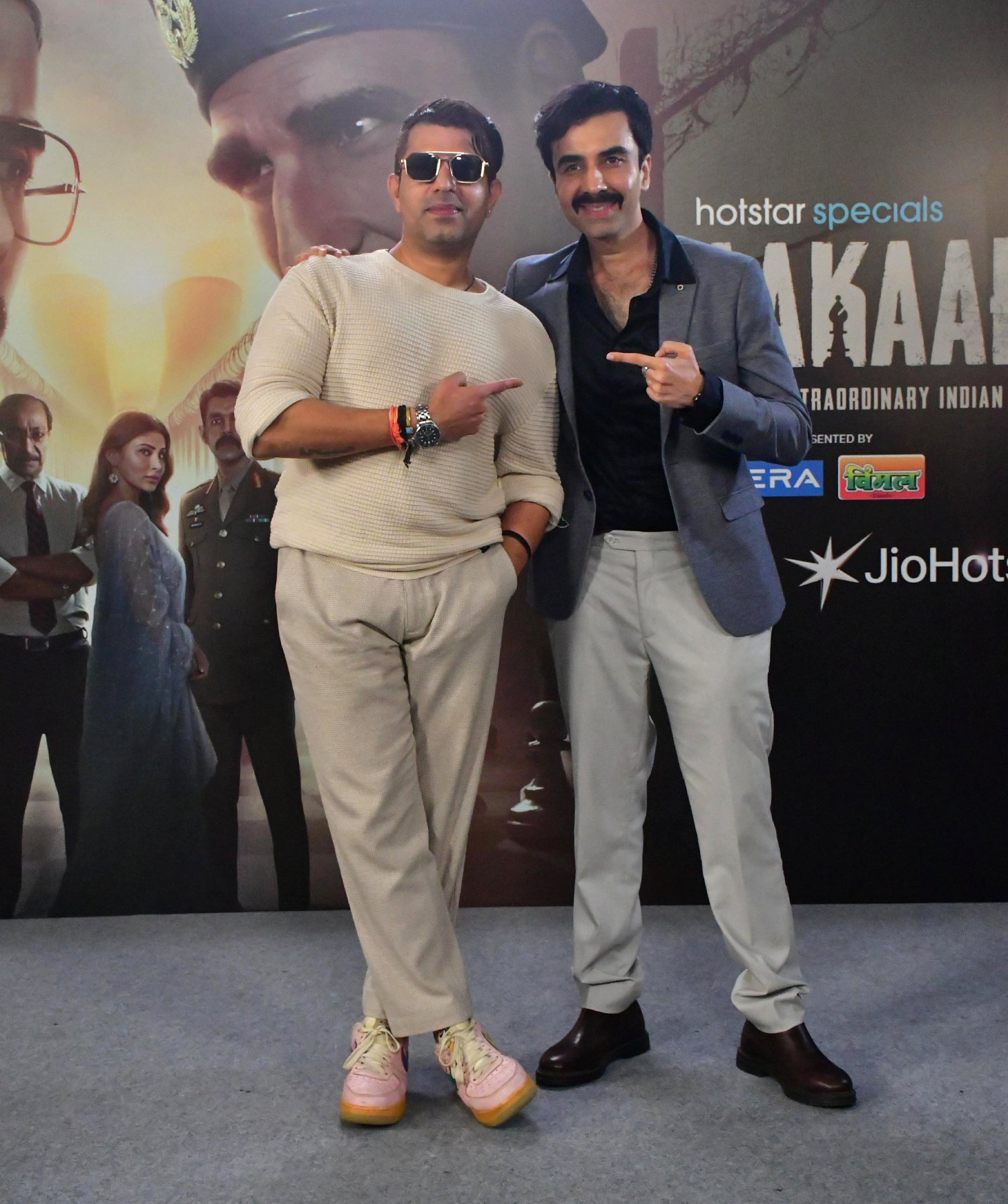 Director Faruk Kabir joins Naveen Kasturia for a dynamic frame during the media interaction session.