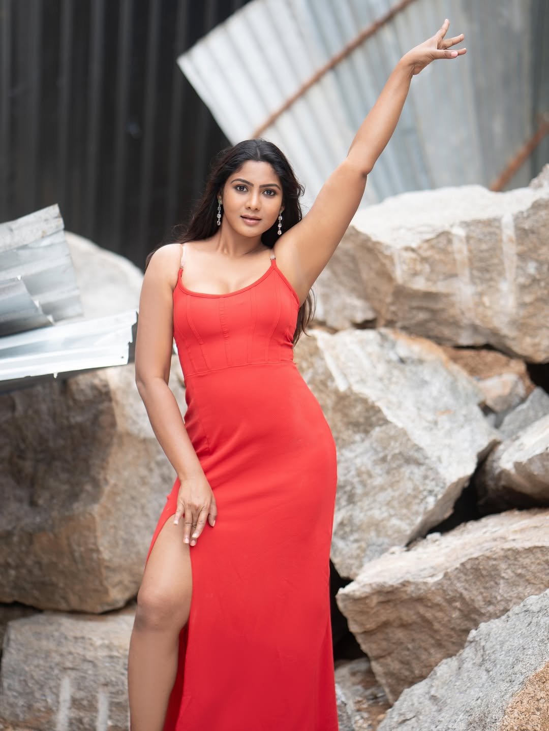 Shruti Reddy in fiery red dress confident pose