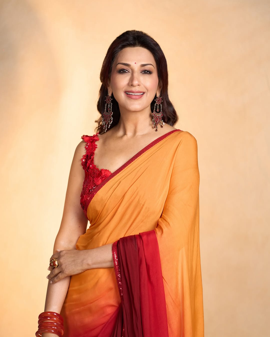 Sonali Bendre radiates timeless elegance and vibrant style, proving that a splash of color and a dash of confidence never go out of fashion–she’s truly a saree superstar with a glamorous twist!