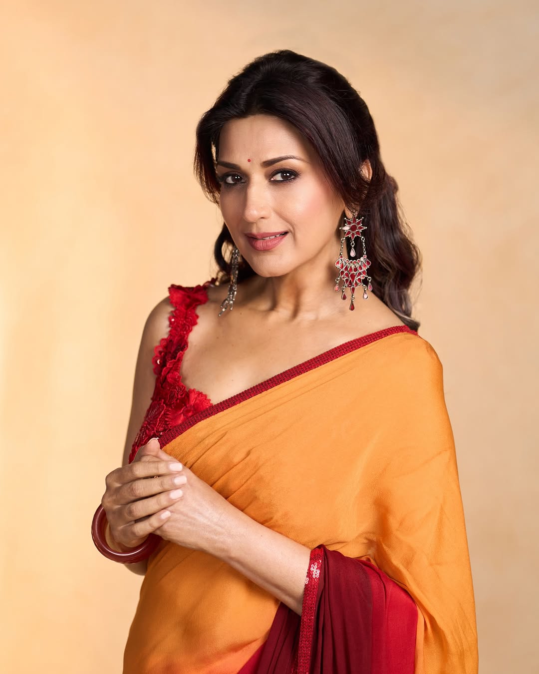 Sonali Bendre effortlessly combines timeless grace with bold style, proving that a splash of color and a touch of sparkle can make every moment a celebration–fashion, humor, and confidence all in one frame!