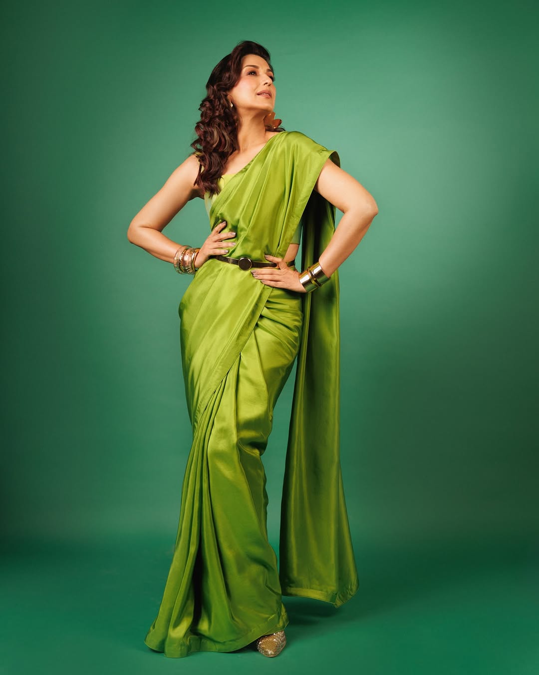 Sonali Bendre shines with grace in green saree