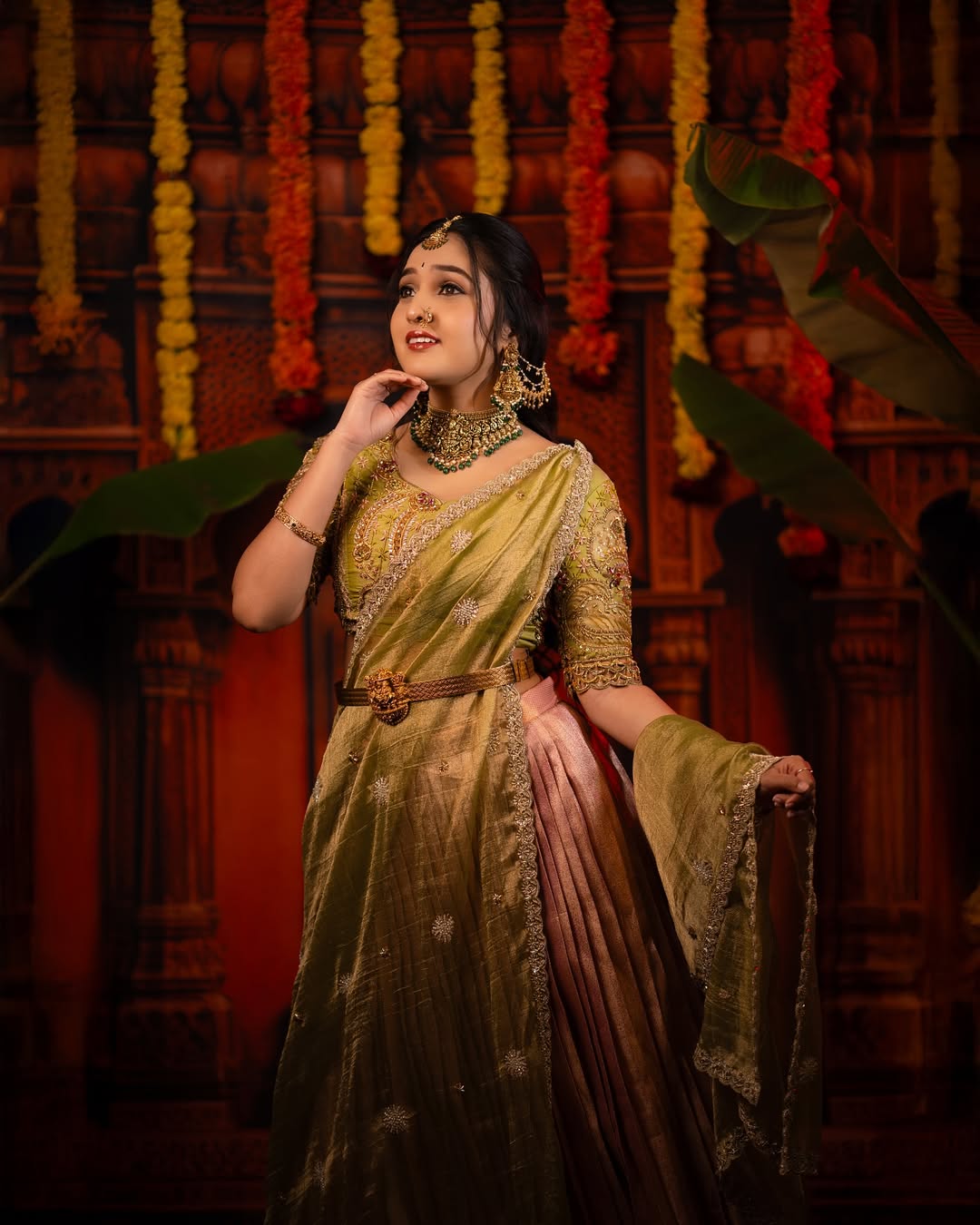 Spandana Somanna glowing in vibrant traditional attire