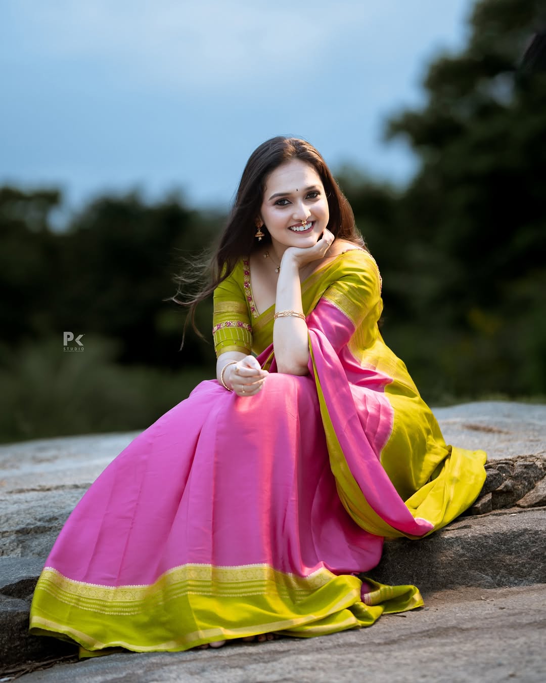 Spandana Somanna in elegant colorful saree pose