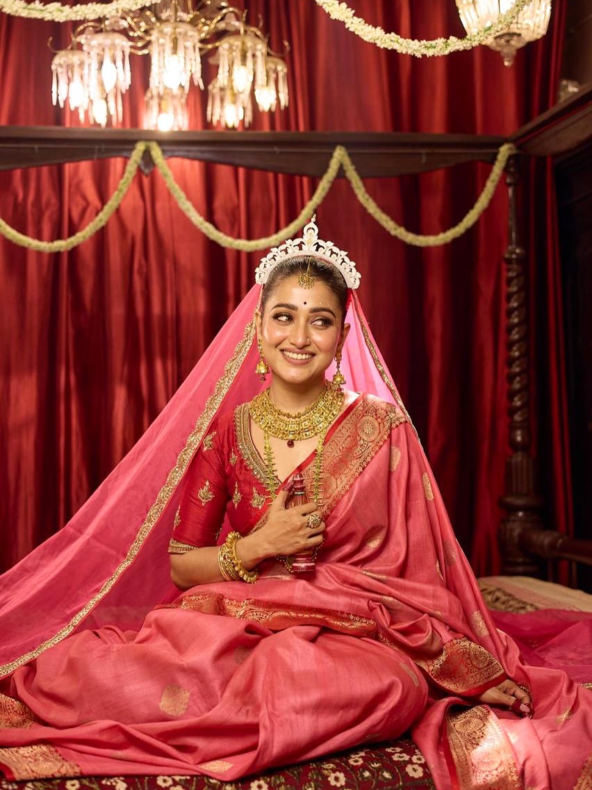Sudipta Banerjee in regal traditional attire charm