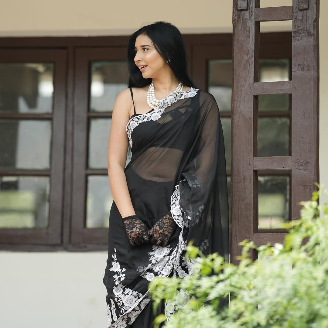 Tanya Mittal exudes mystery in black lace saree