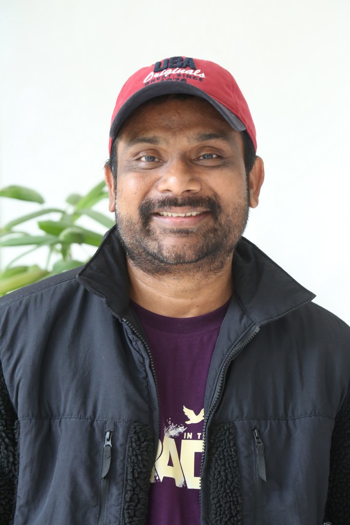 Vijay Donkada rocks black jacket and purple tee