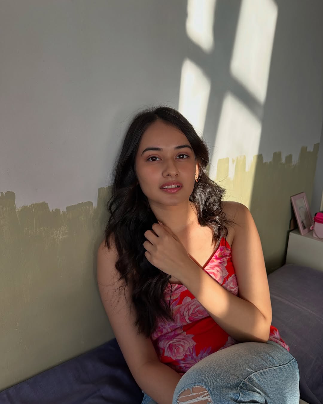 Virti Vaghani exudes effortless elegance, proving that a splash of florals and a dash of shadows can make any moment picture-perfect–and maybe even a little humorous.