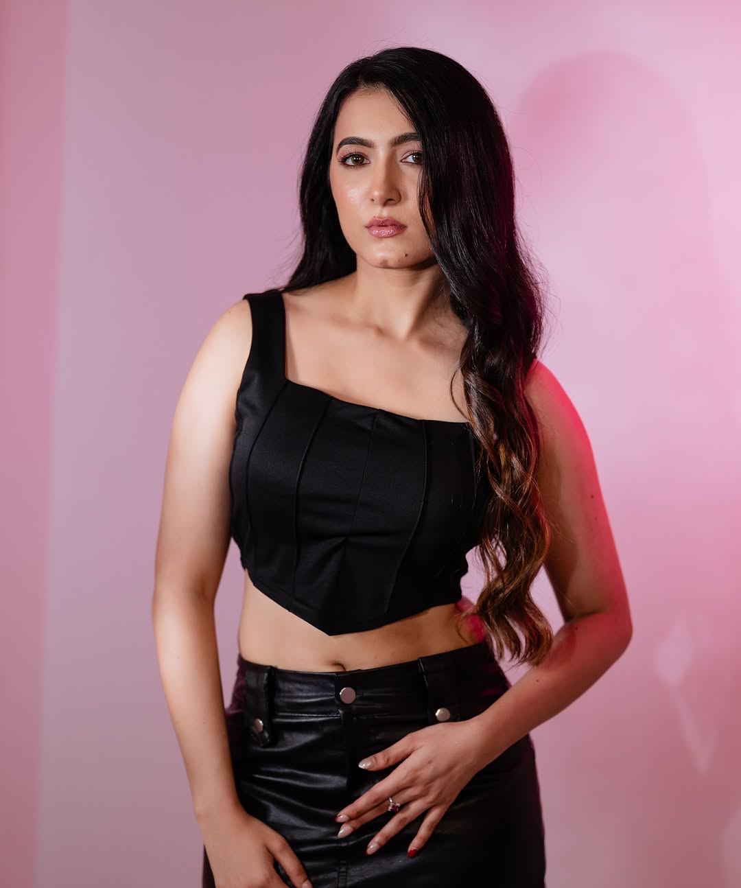 Adhvithi Shetty rocking black top and leather skirt confidently