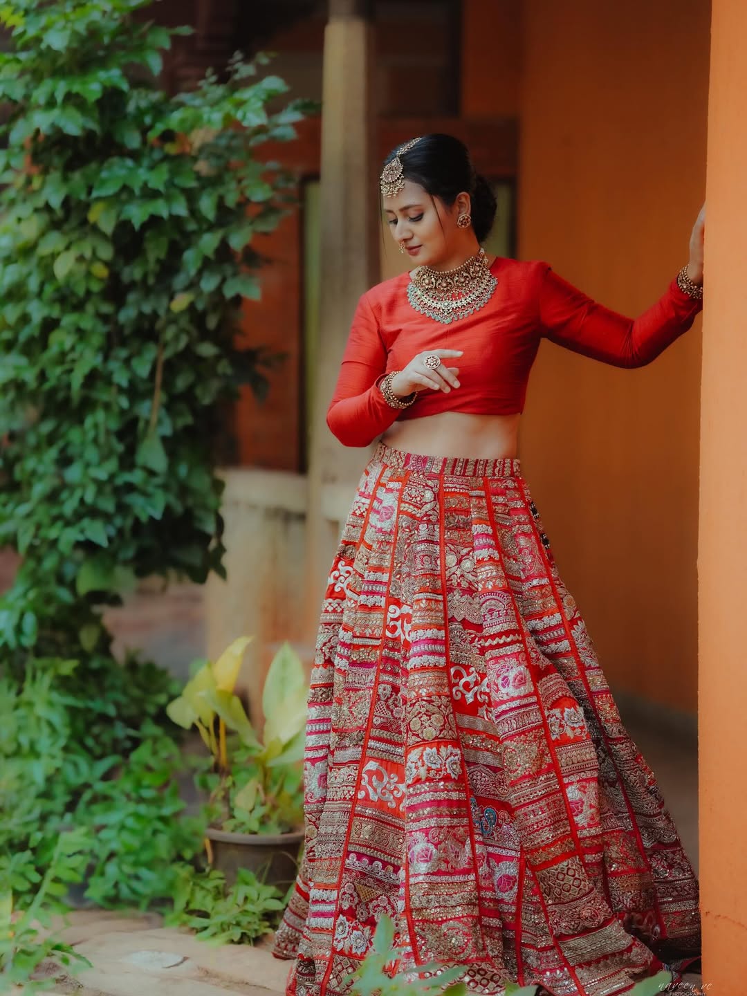 Amulya timeless elegance in bold red traditional outfit