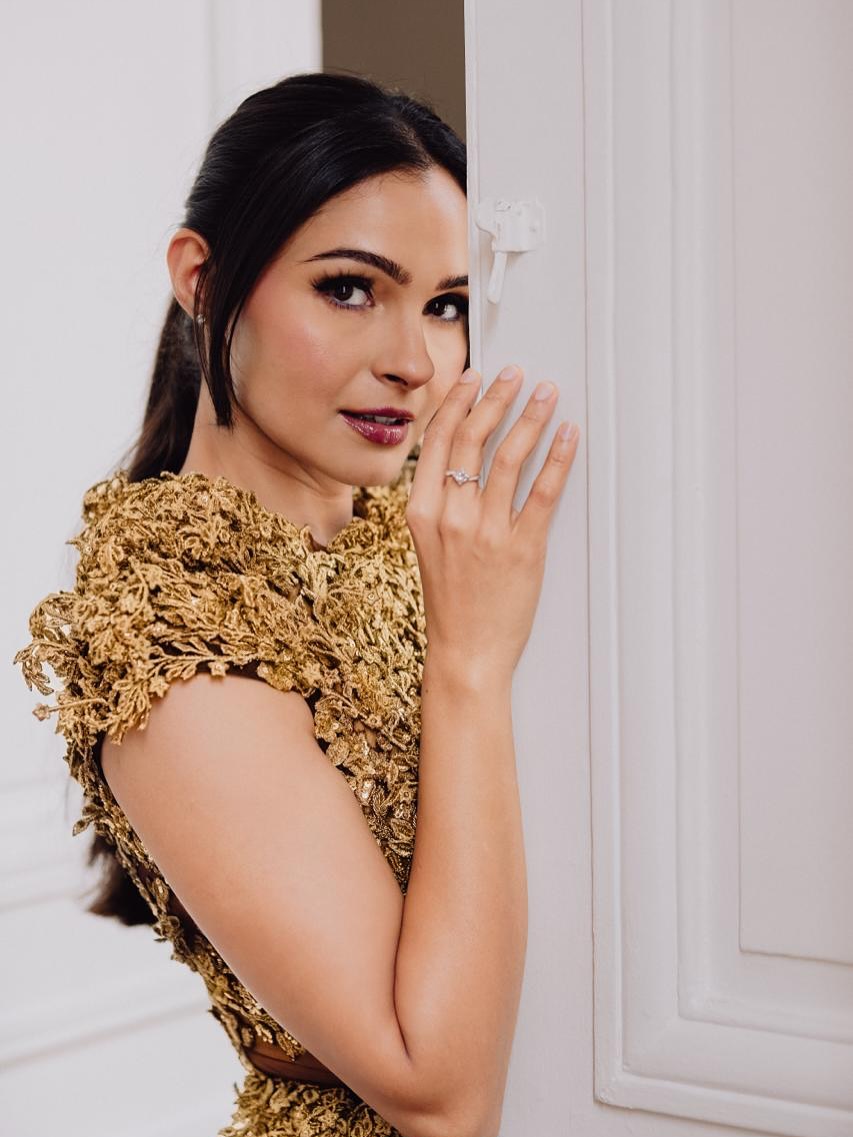 Andrea Jeremiah in a rich textured gold ensemble