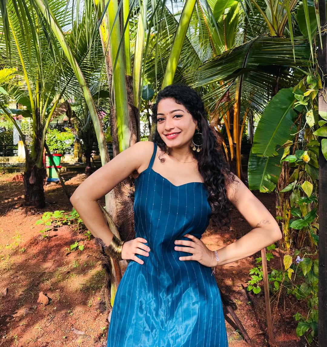 Anjali Nair radiates tropical elegance in blue dress