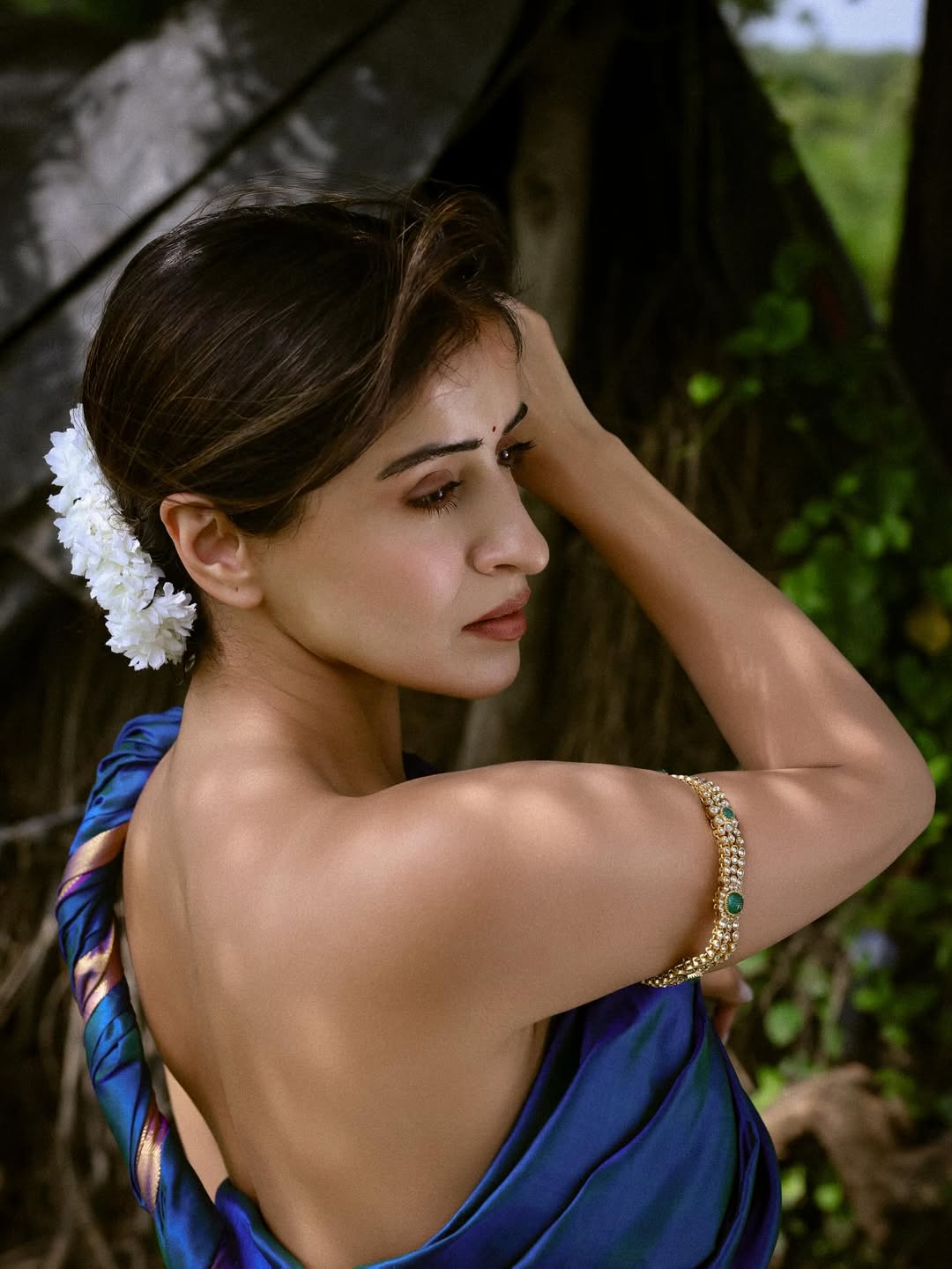 Anshu Ambani radiates elegance in blue saree outdoors