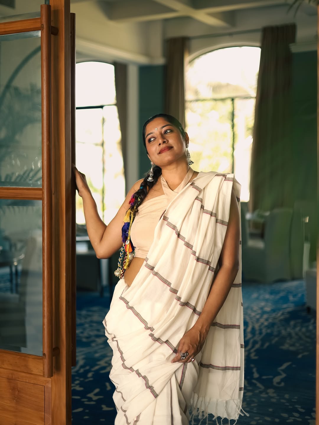 Anumol blends tradition and style in classic saree