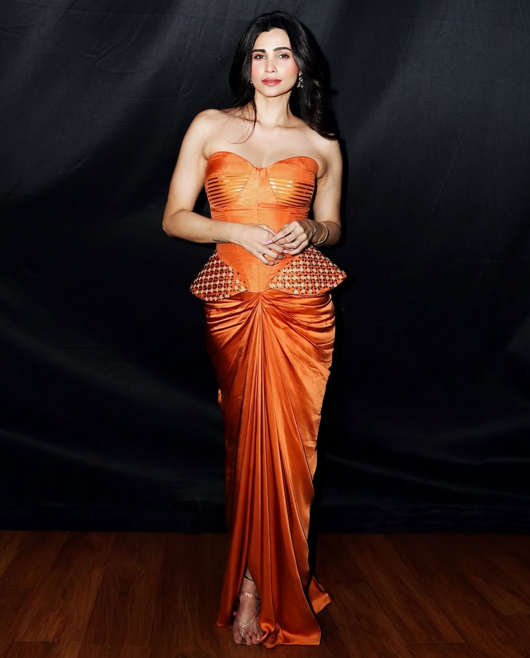 Daisy Shah confidently rocking bold orange fashion gown
