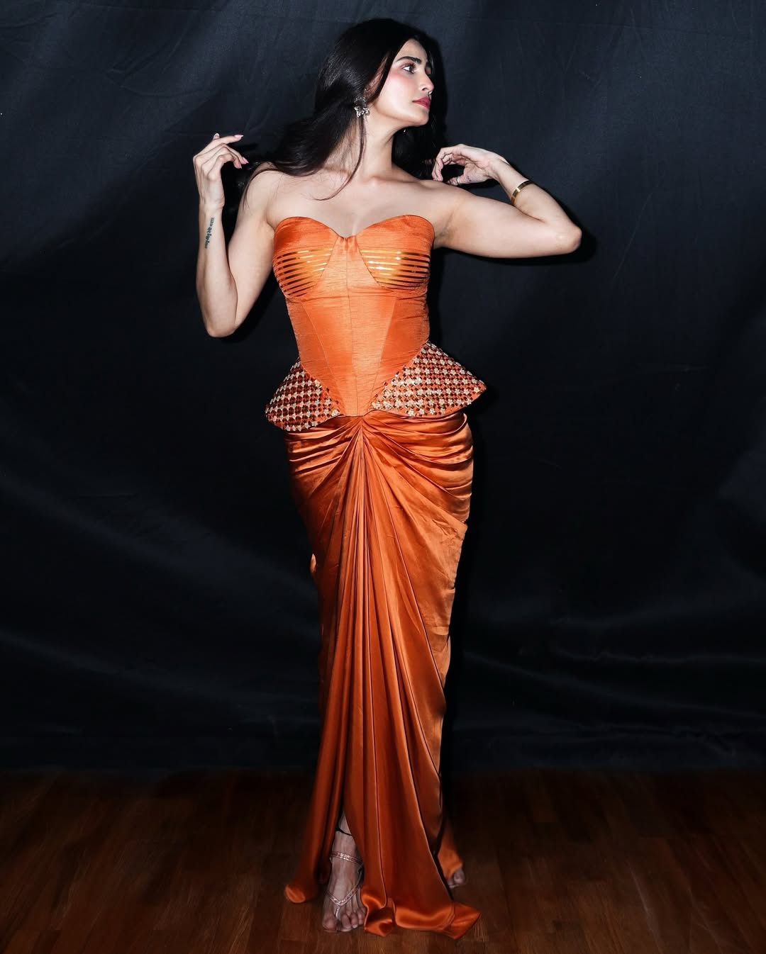 Daisy Shah commands attention in stunning orange look