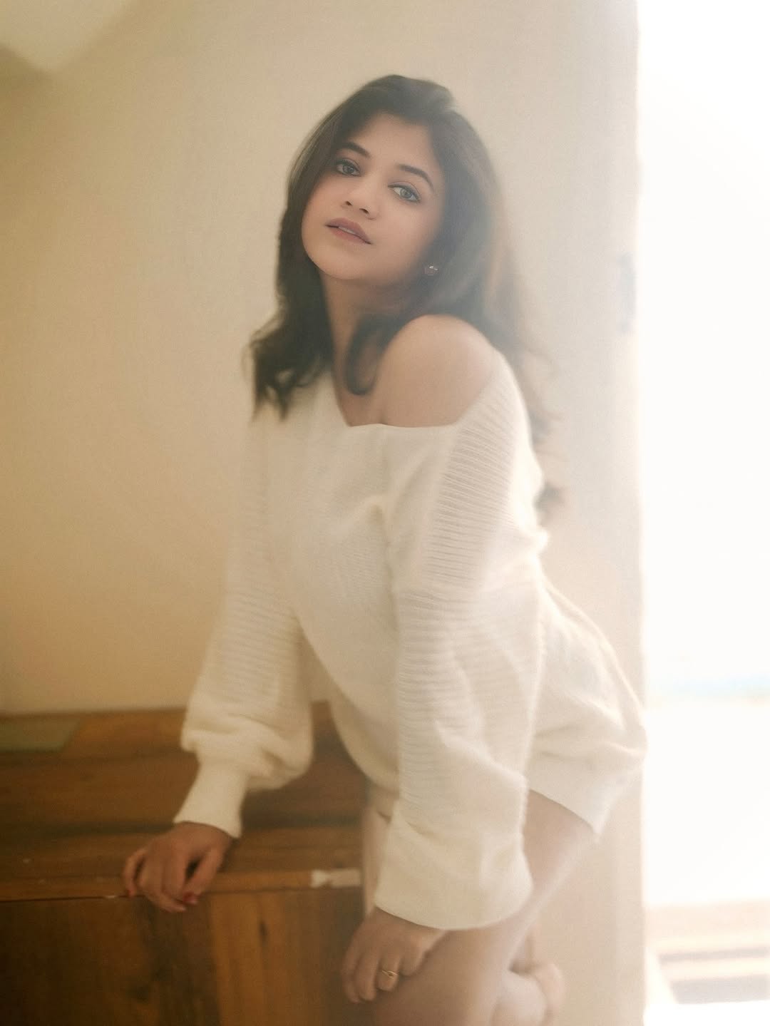 Deepika Gowda chic off shoulder sweater style