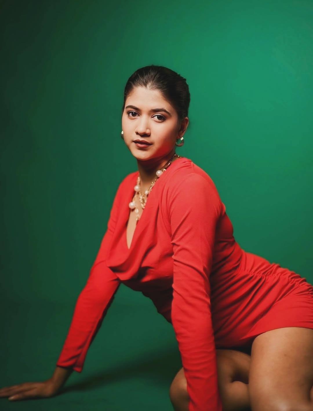 Deepika Gowda in bold red ensemble with sophistication