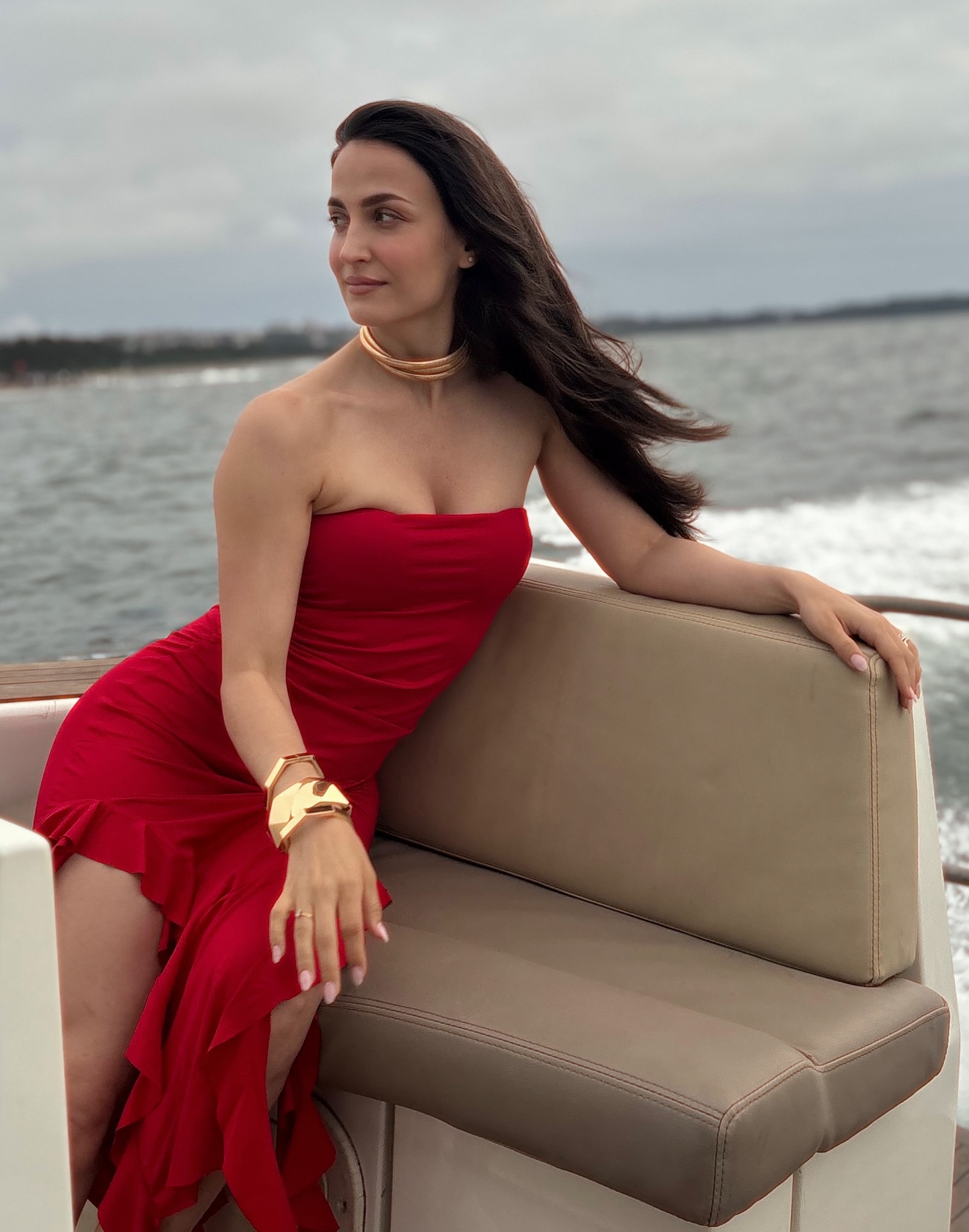 Elli Avram turns heads in bold red outfit