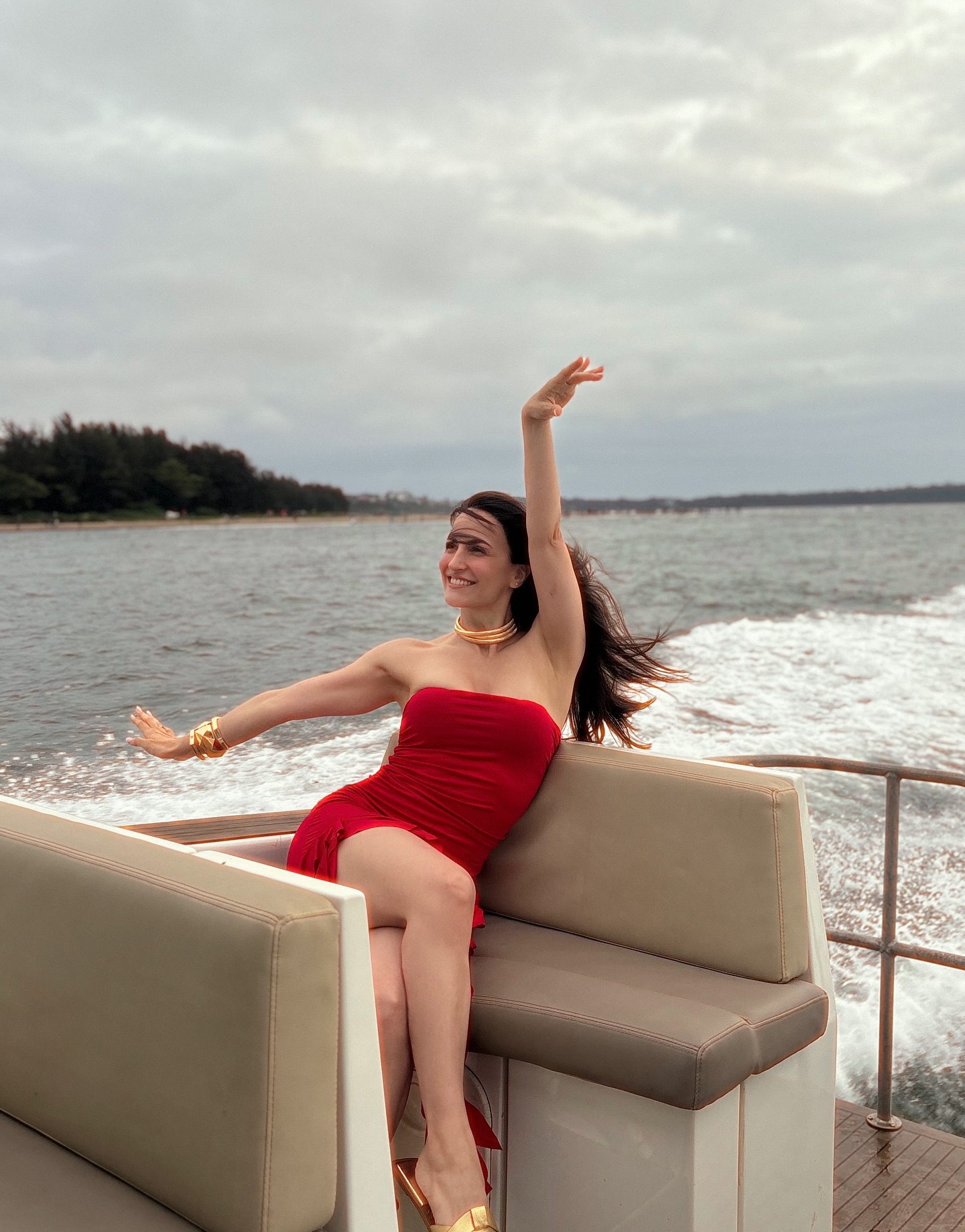 Elli Avram sailing in style with red dress