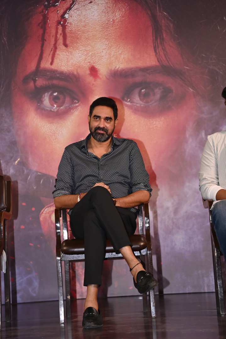 Krish Jagarlamudi seated calmly at event