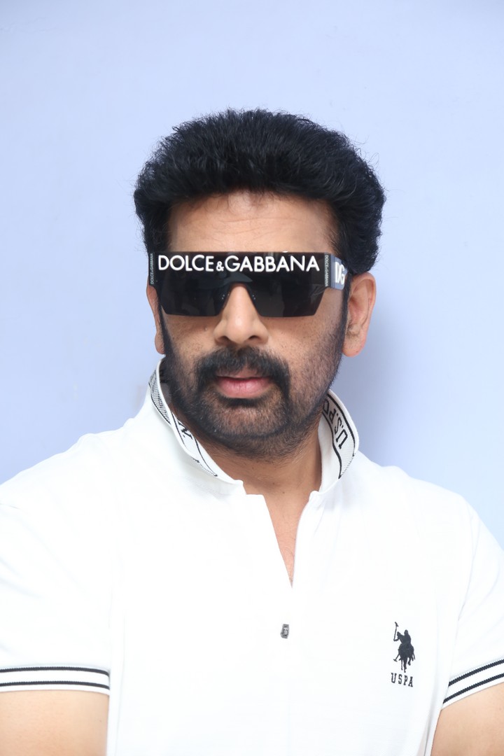 J. D. Chakravarthy in stylish white polo look