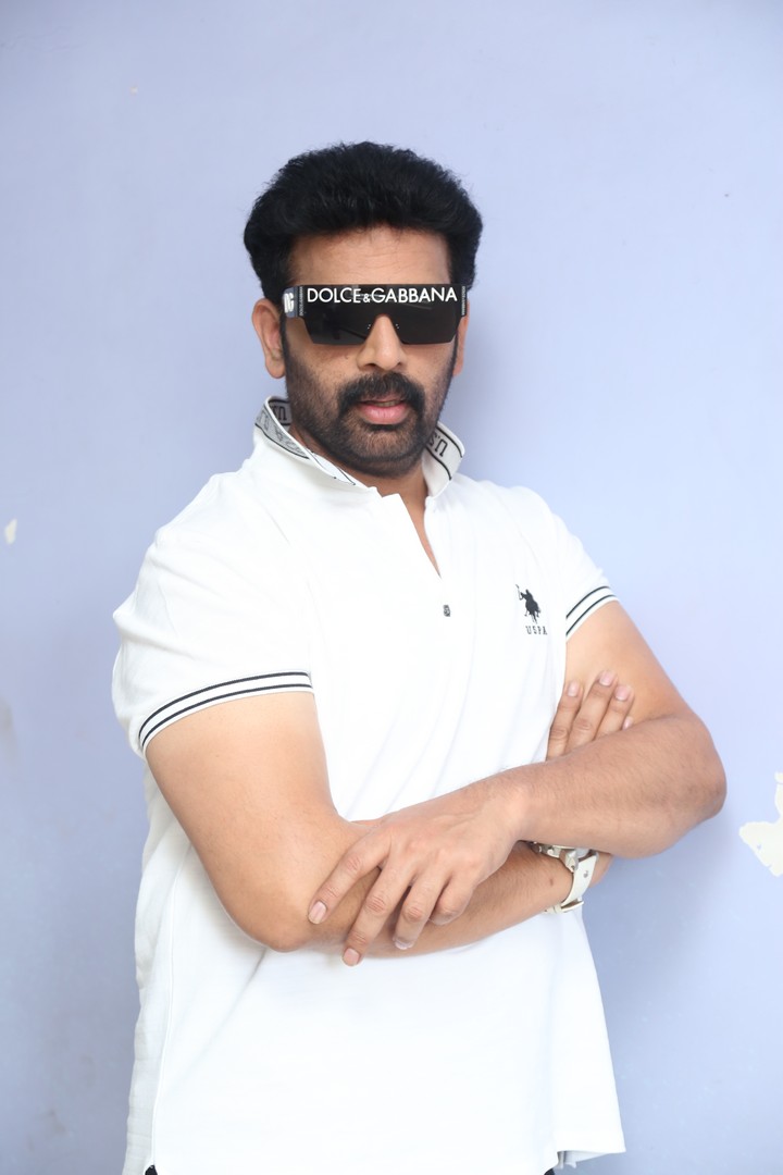 J. D. Chakravarthy confident look in white polo