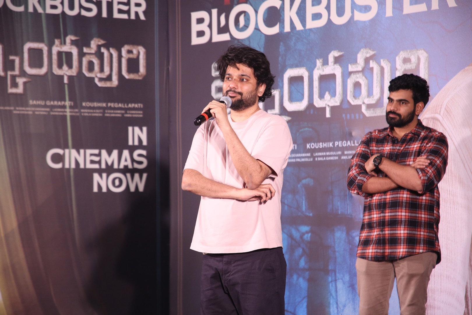 Music director giving speech on stage