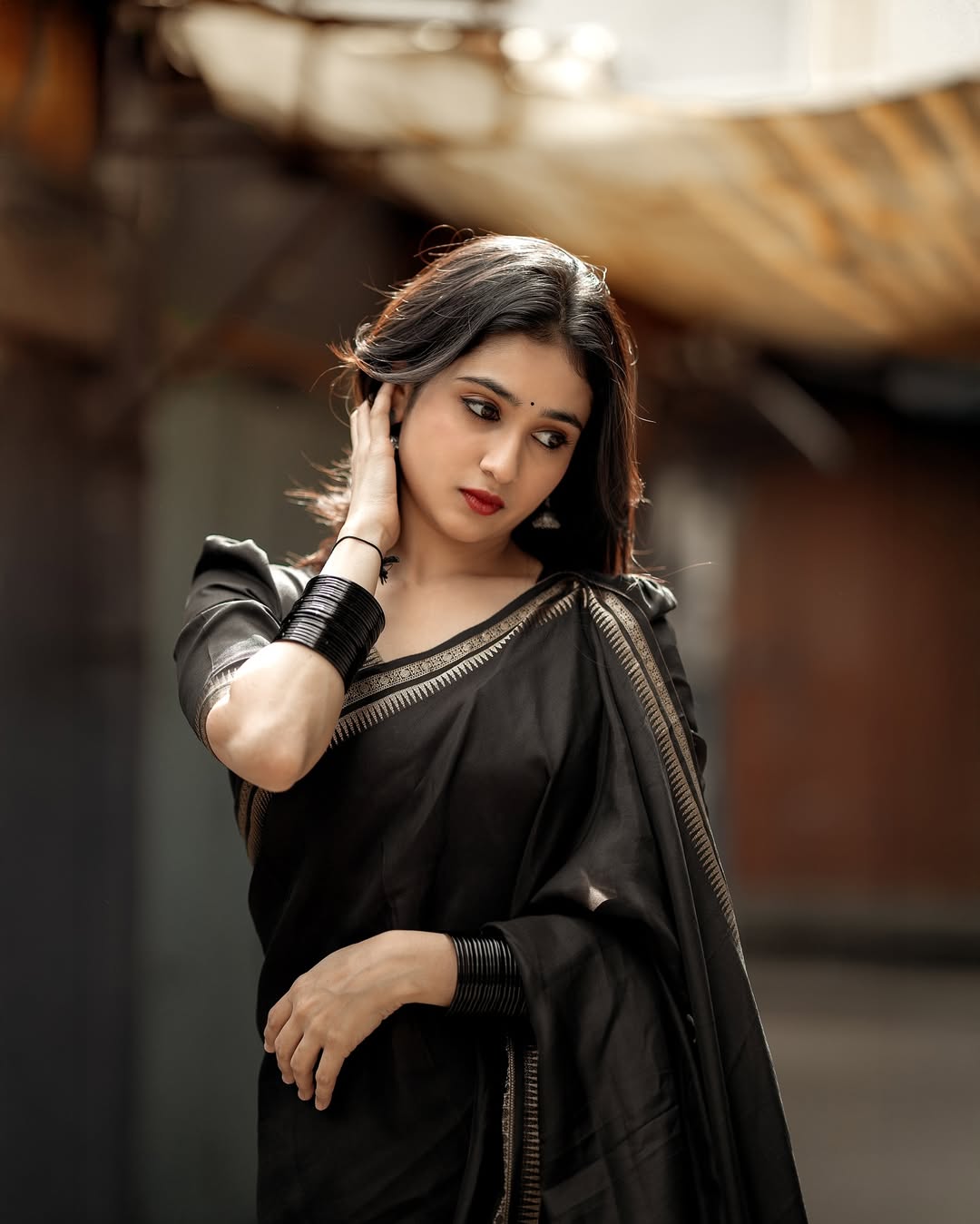 Malaika Vasupal timeless elegance in sleek black saree