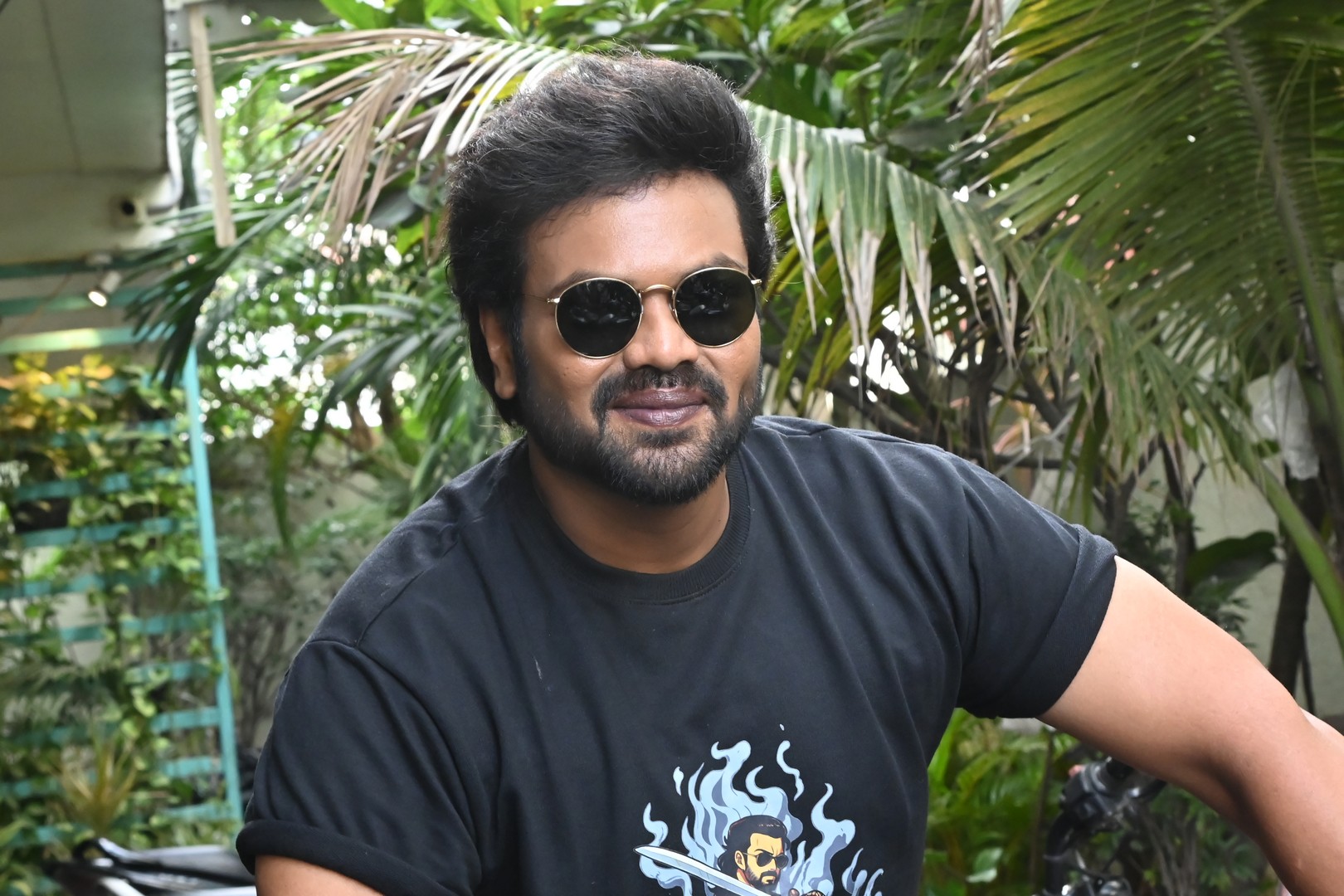 Manchu Manoj black graphic tee ignites summer style