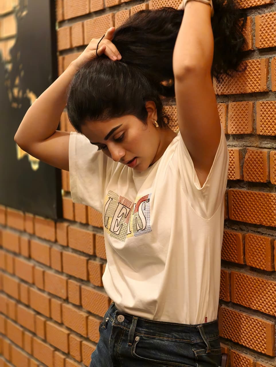 Megha Shetty chic style with confident playful pose