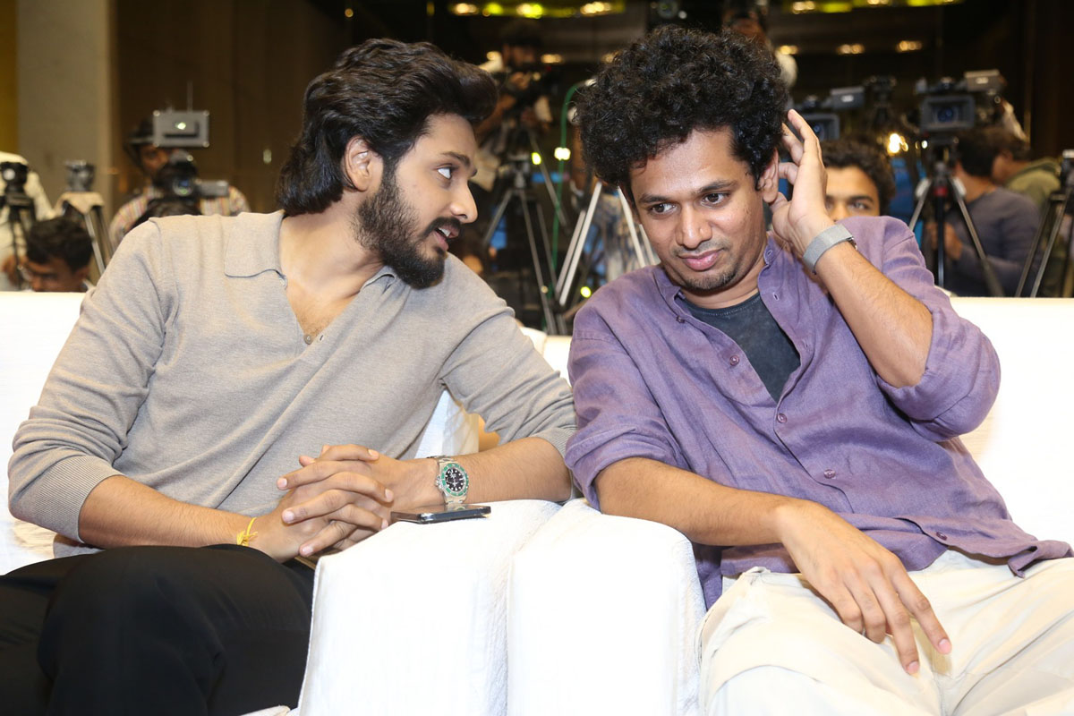 Teja Sajja in discussion with director Karthik