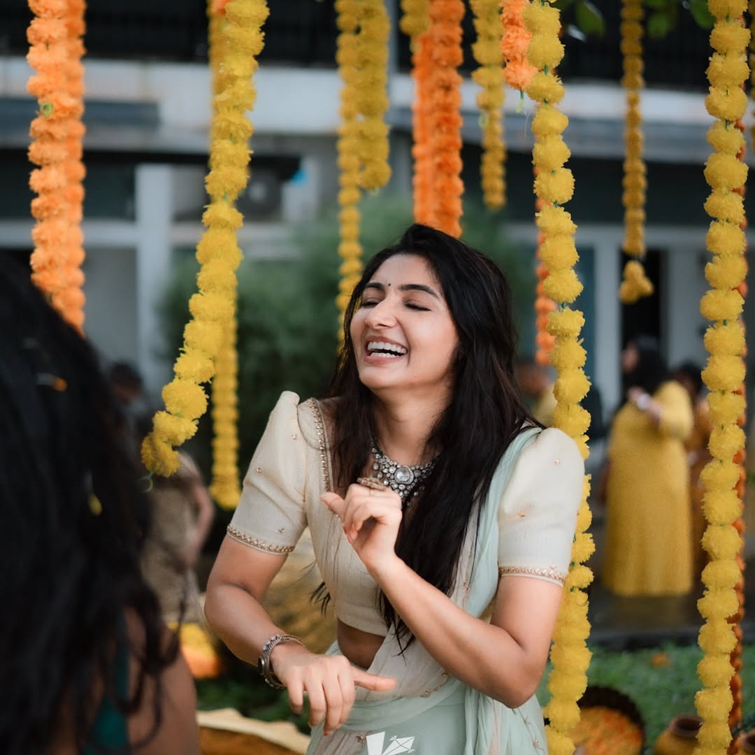 Mirna Menon exudes elegance with playful charm under curtains