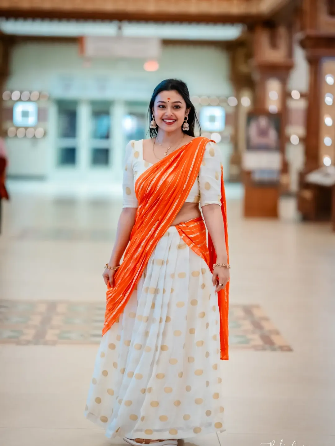 Moksha adds sunshine with vibrant orange polka dot