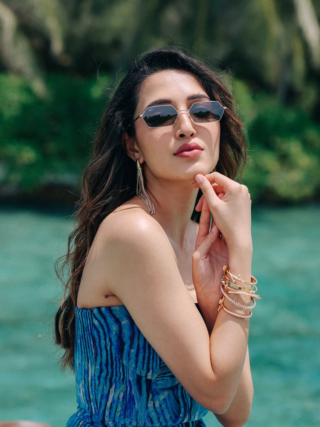 Neha Shetty elegant by water in stylish look